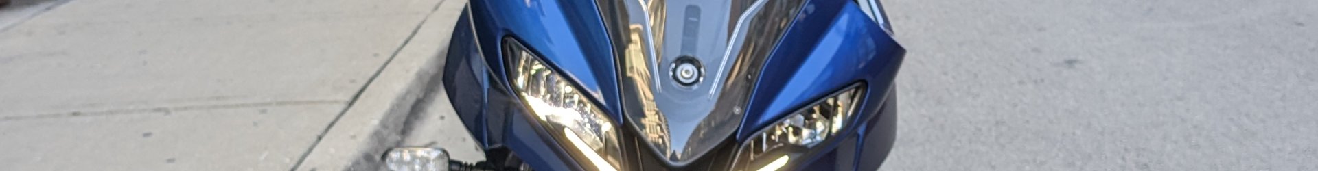 front headlights of a blue motorcycle